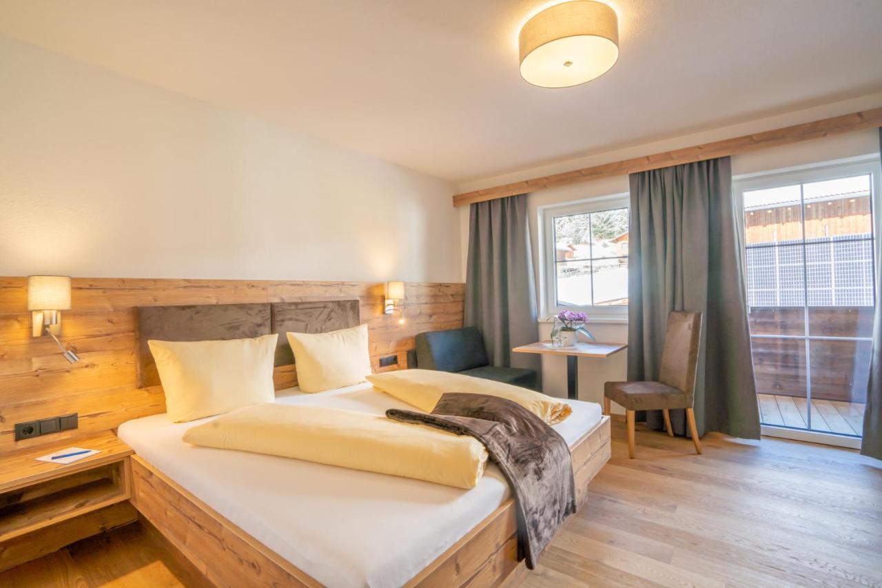 Dreibettzimmer mit Balkon