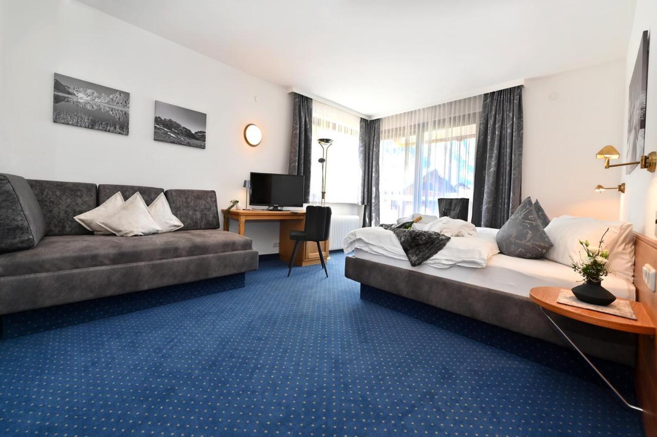 Comfort Familienzimmer mit Balkon und Bergblick