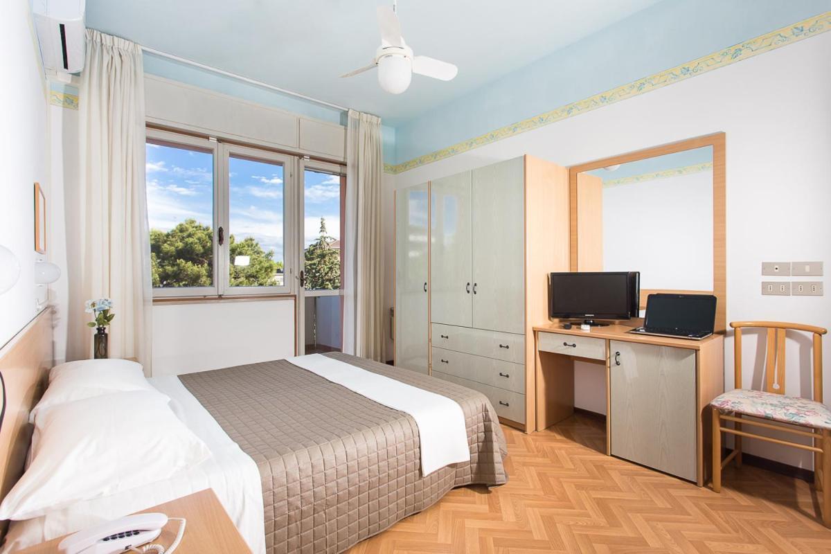 Habitación Cuádruple Confort