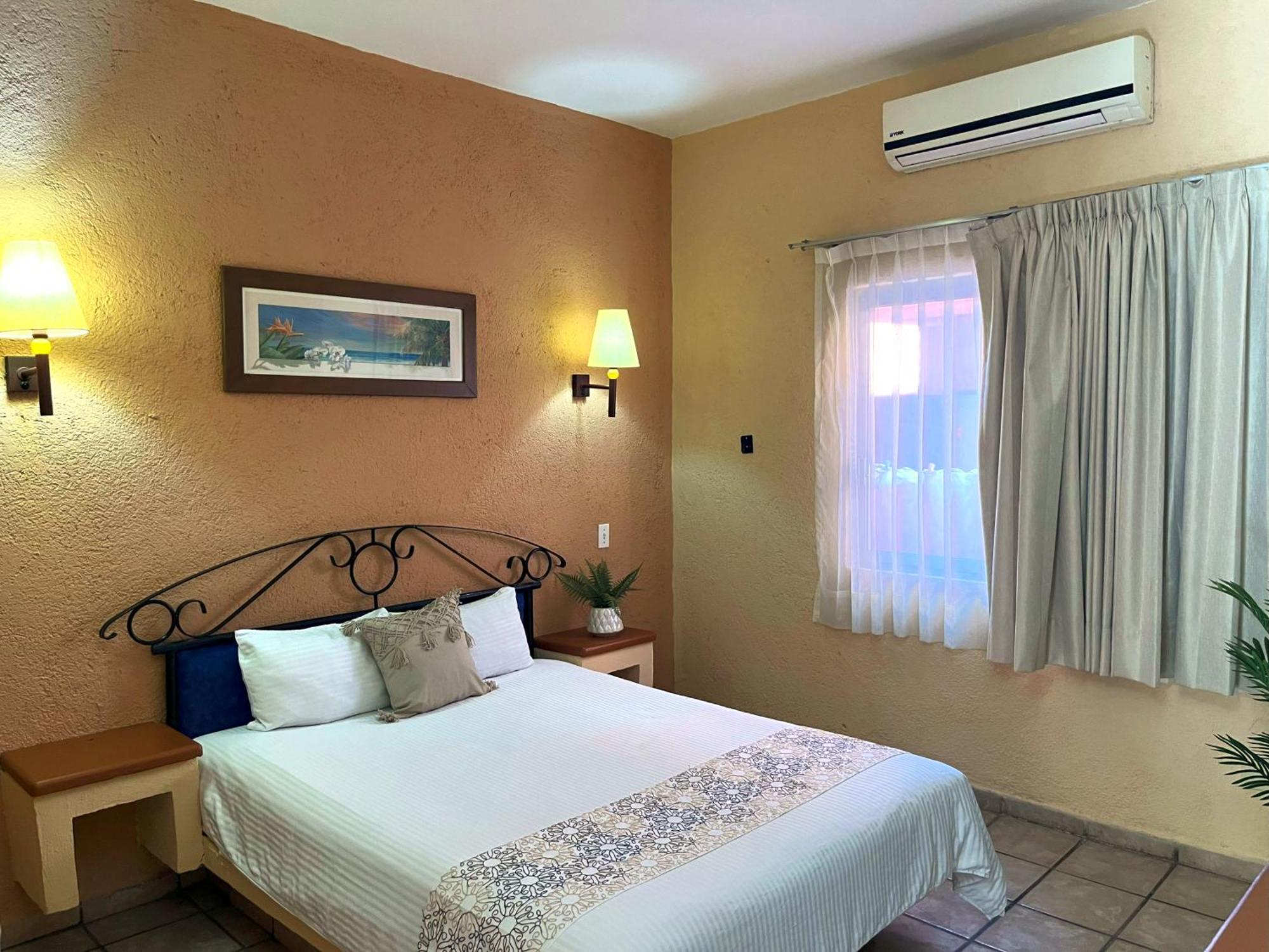Habitación con cama grande
