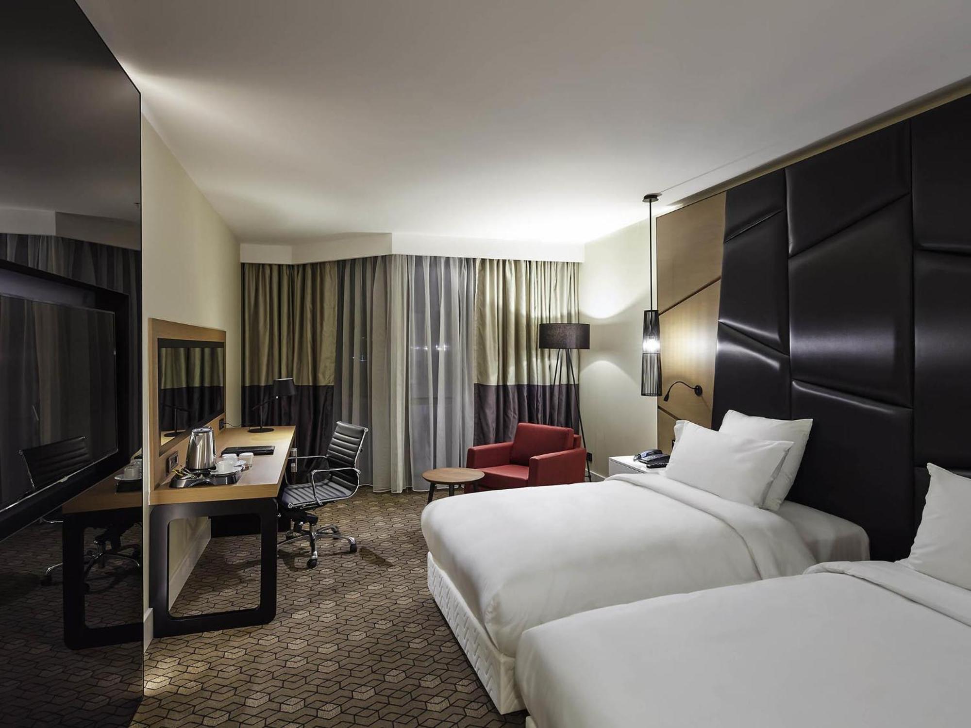 Quarto Deluxe com 2 Camas Individuais - Vista Cidade