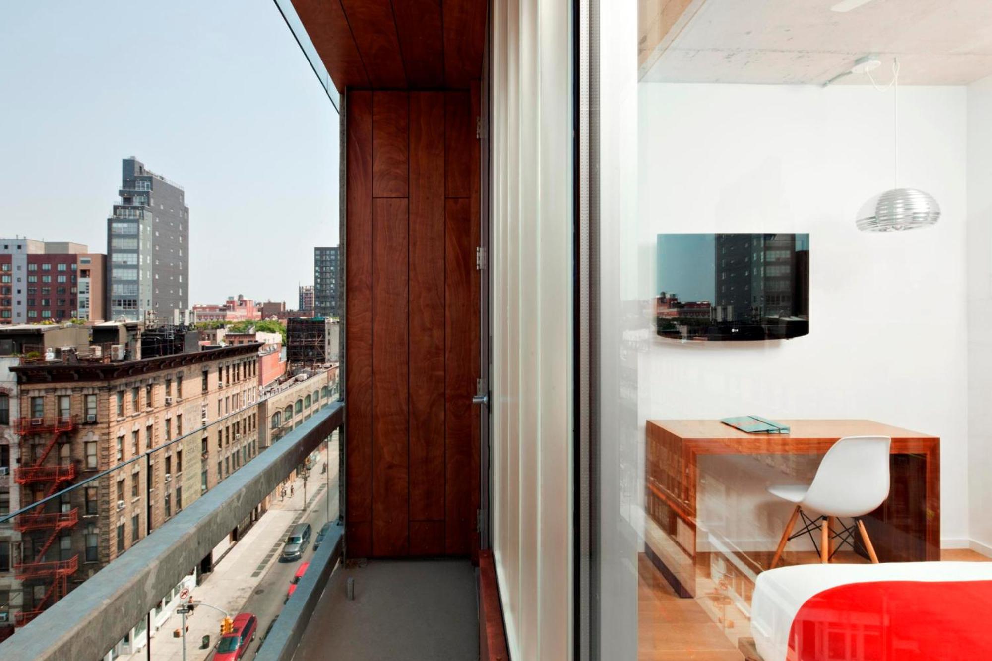 Habitación Superior con cama grande y balcón