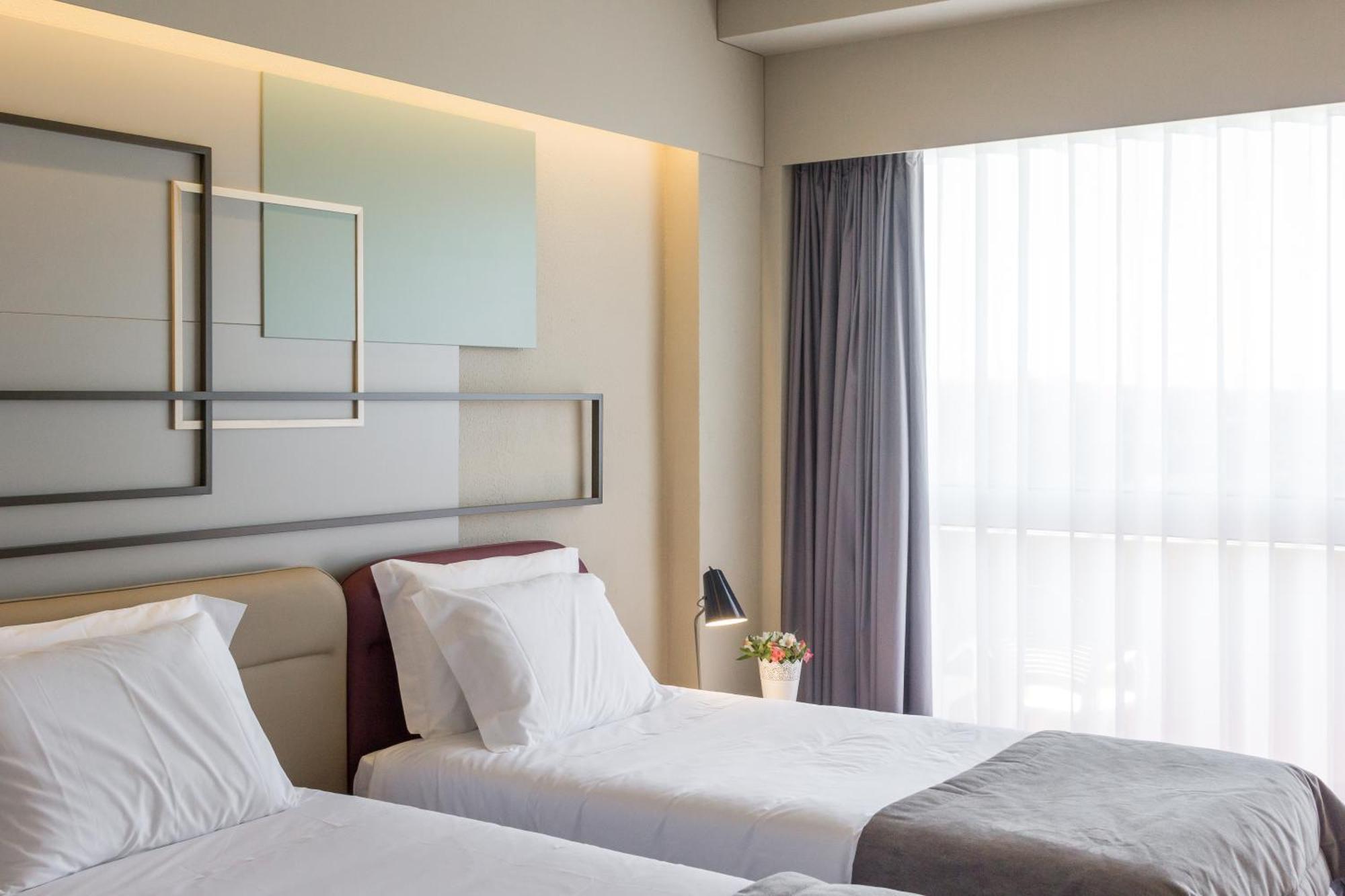 Tweepersoonskamer met 1 of 2 Bedden en een Extra Bed