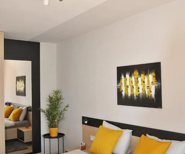 Maxim Apartments