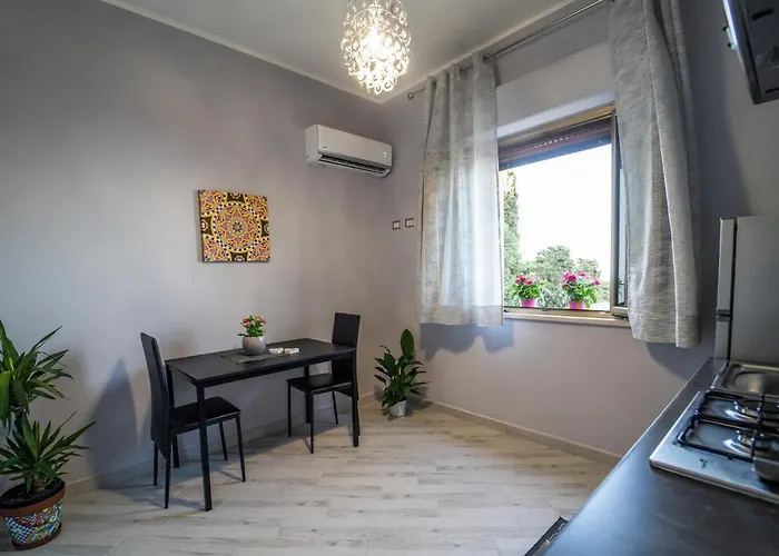 Tyche Apartaments & Rooms