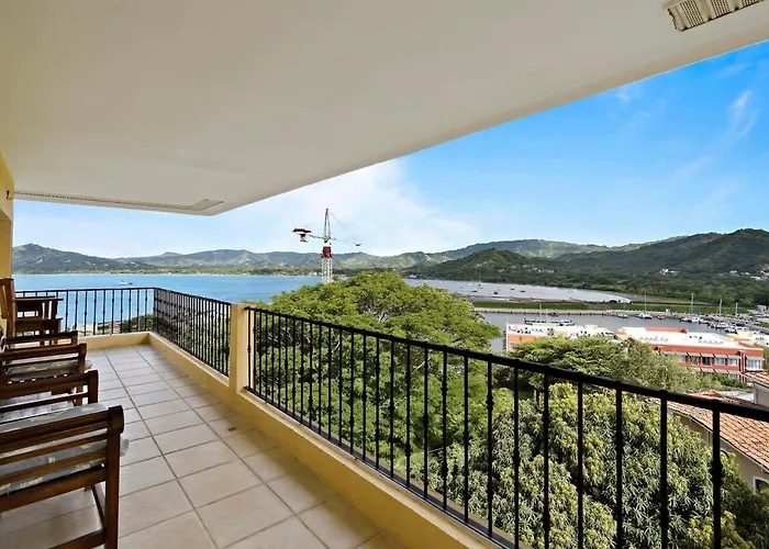 Remodeled Top-Floor Condo With Stunning Wrap-Around Balcony Offering Mountain, Ocean & Marina Views