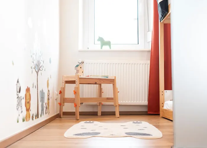 Bunter Hund Apartments - Zentrales Apartment, Parkplatz, Wintergarten, Kinderzimmer