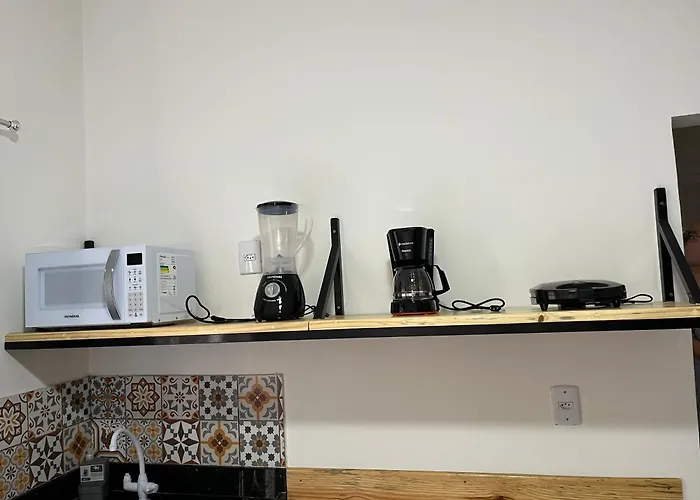 Flat com ar e varanda com linda vista para o Ibituruna - Vôo Livre 203