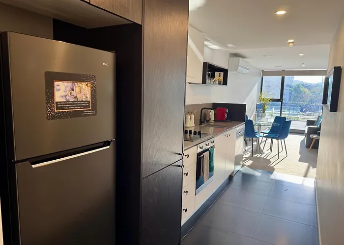 Midnight Luxe: Chic Braddon Apartment with Pool and Sauna