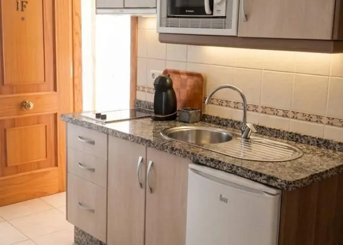 Apartamentos El Barrio