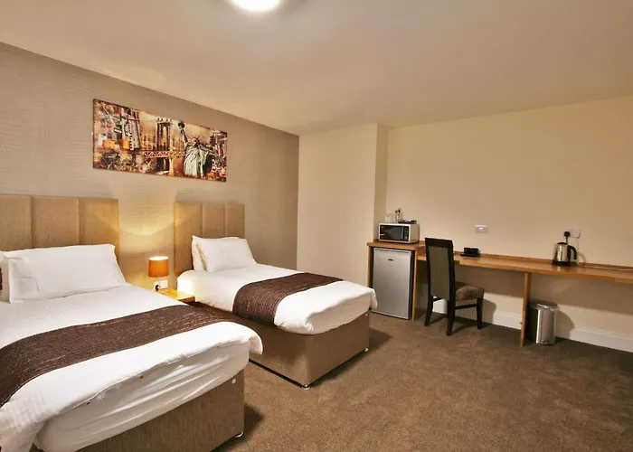 New County Hotel & Serviced Apartments By Roomsbooked